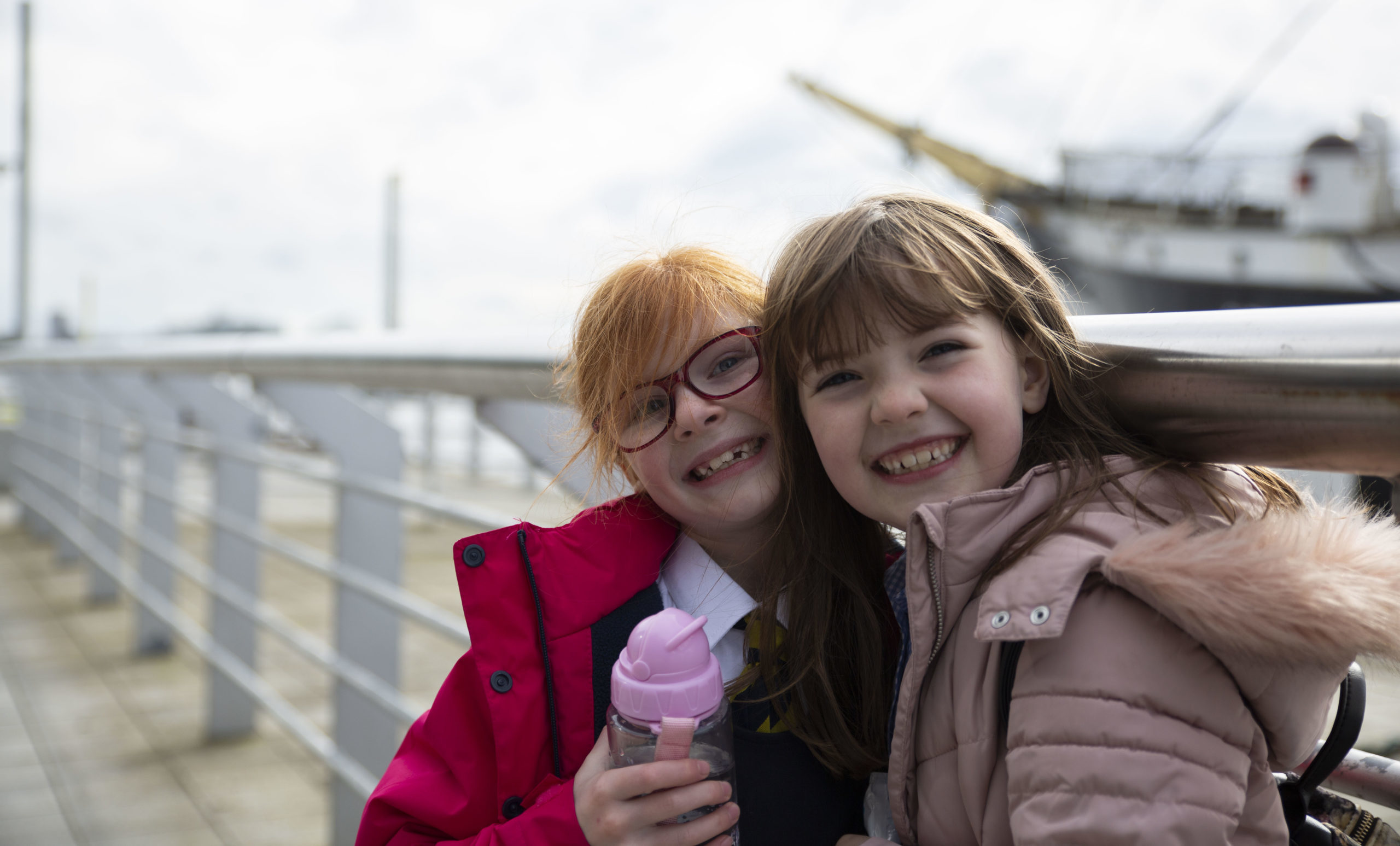 two girls smiling